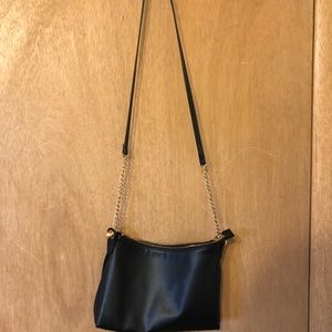 Black medium sized purse with gold chain